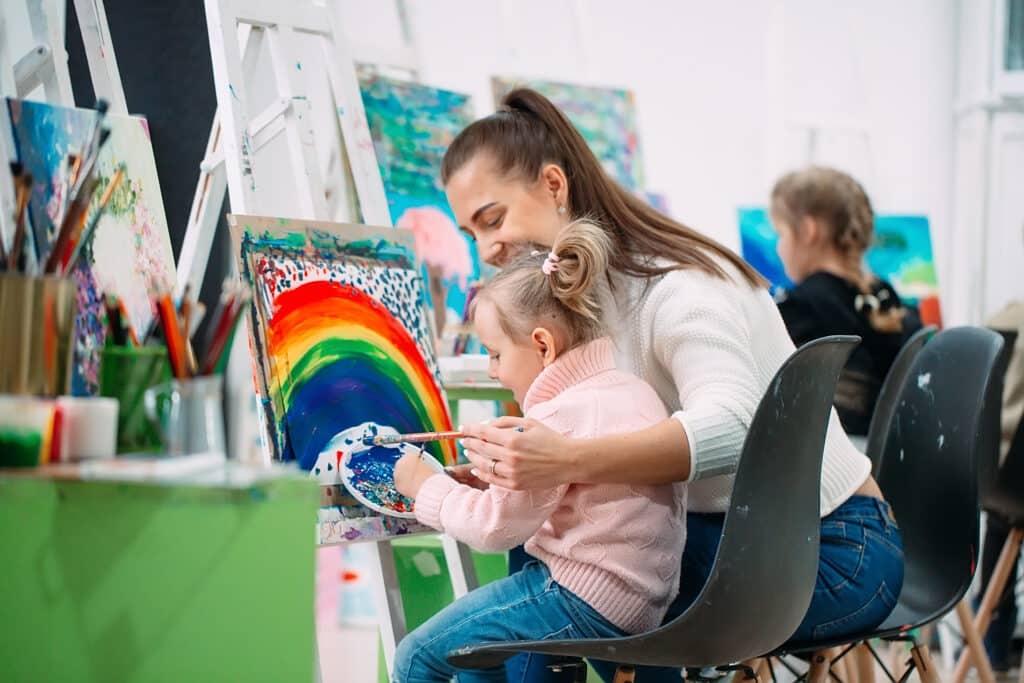 fostering creativity in your homeschooler, preschooler painting a rainbow