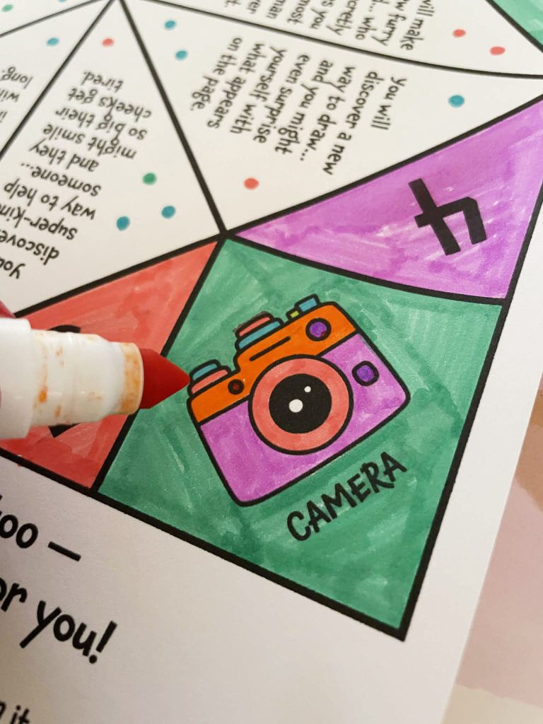 markers and crayons with the New Year's cootie catcher