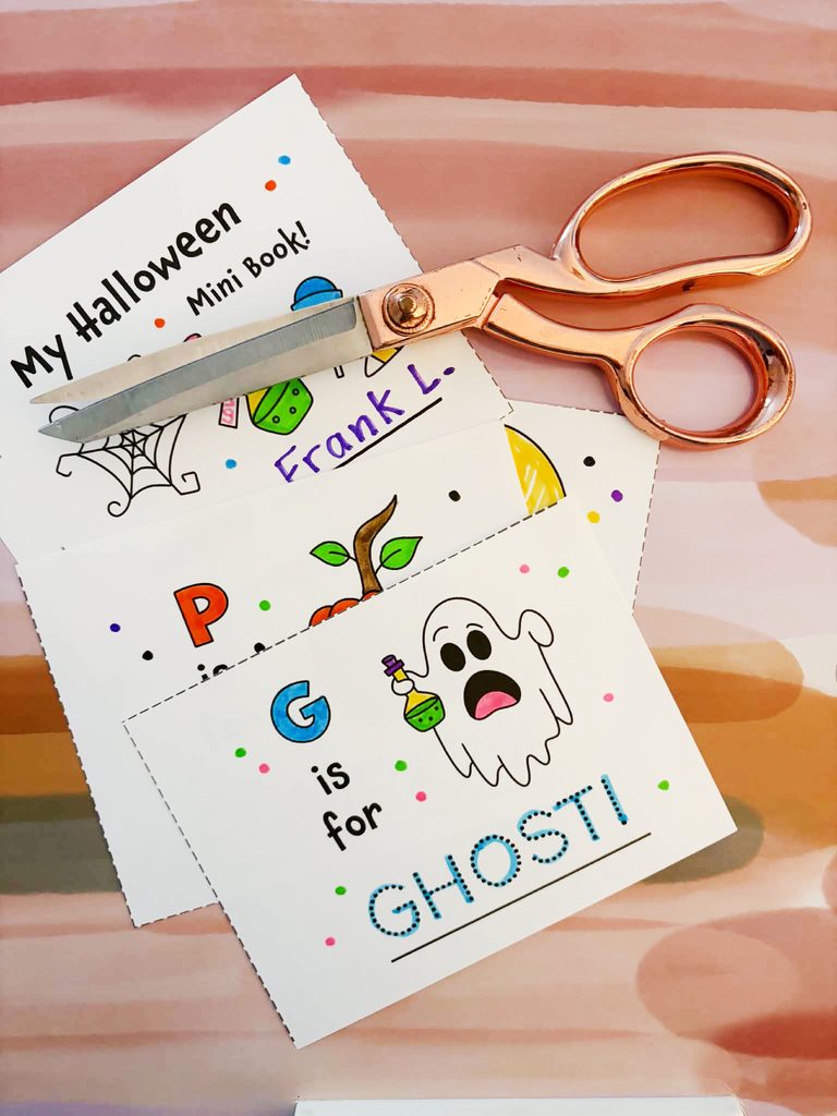 Scissors to cut out pages of Halloween mini book.